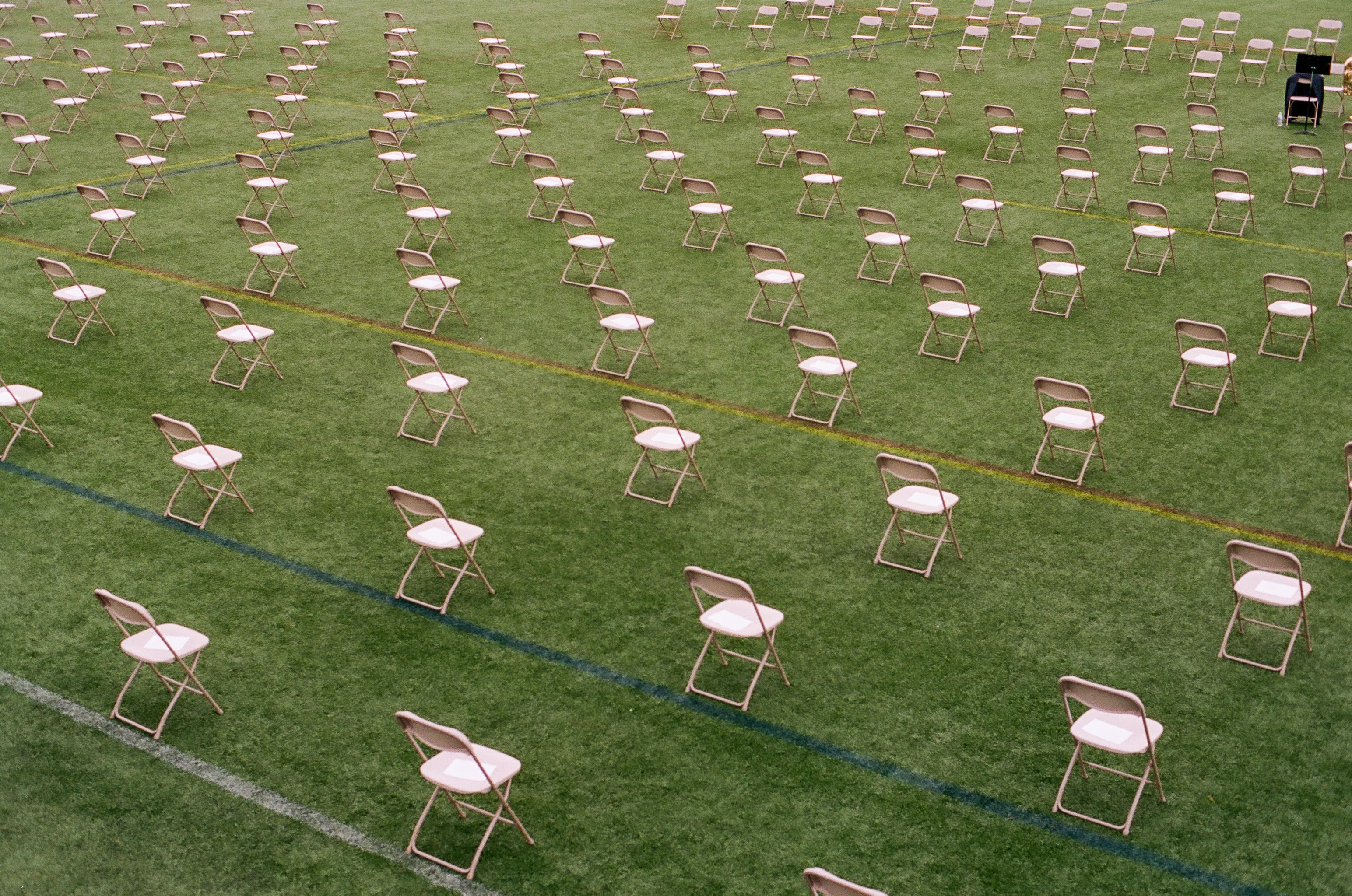 A view of empty seats spaced apart to maintain social distance